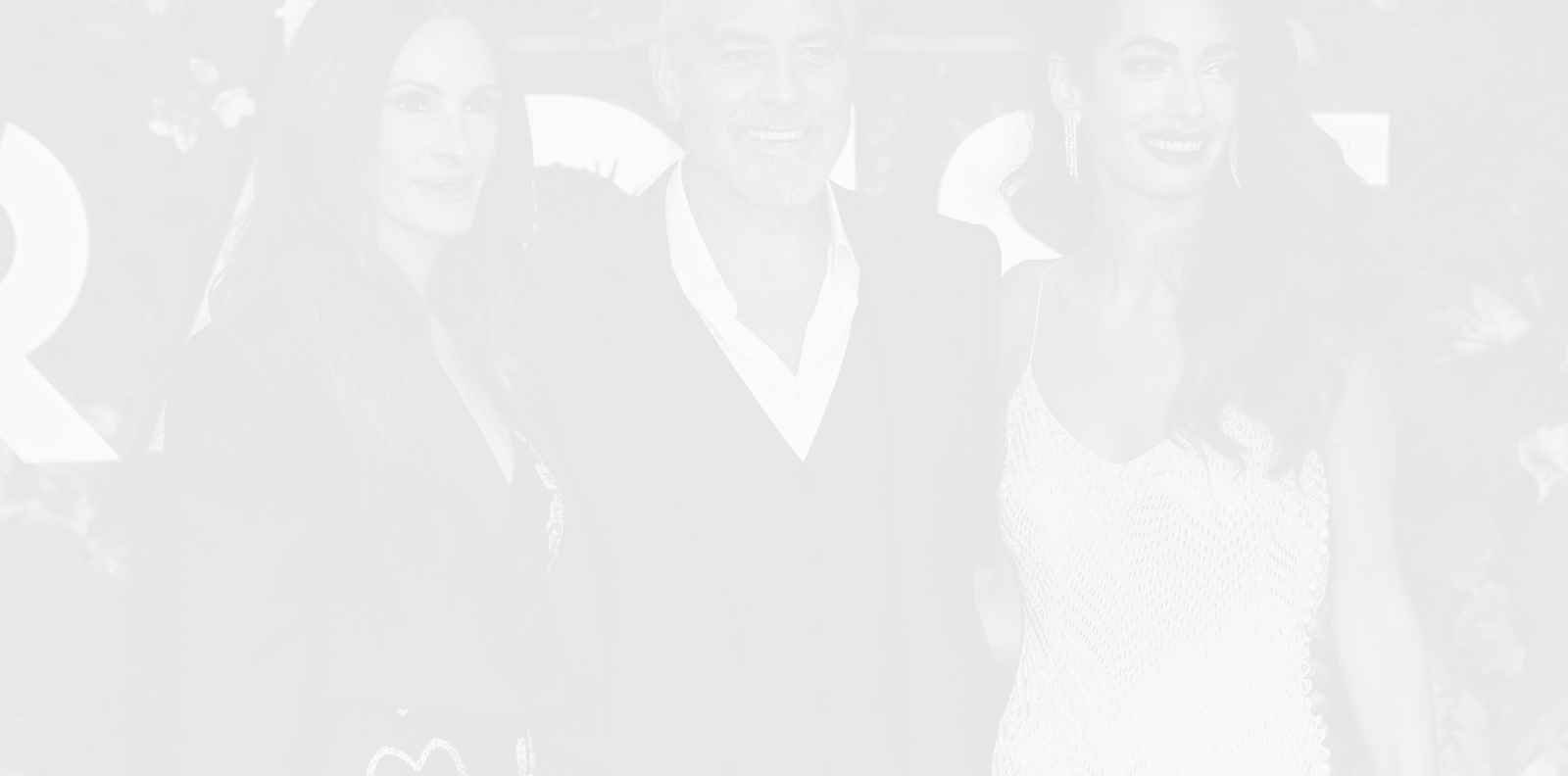 Джордж Клуни е целунал Джулия Робъртс пред жена си