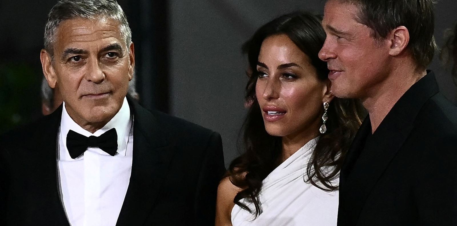 Брад Пит и Джордж Клуни с половините си във Венеция