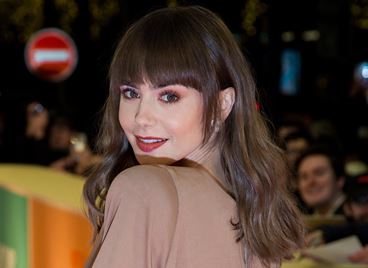 Лили Колинс е била малтретирана от бивше гадже