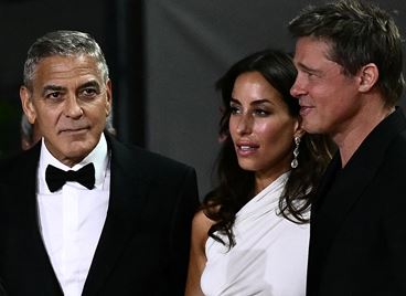 Брад Пит и Джордж Клуни с половините си във Венеция